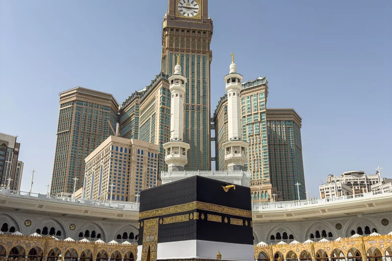 Pilgrims in Ihram below the Clock Tower